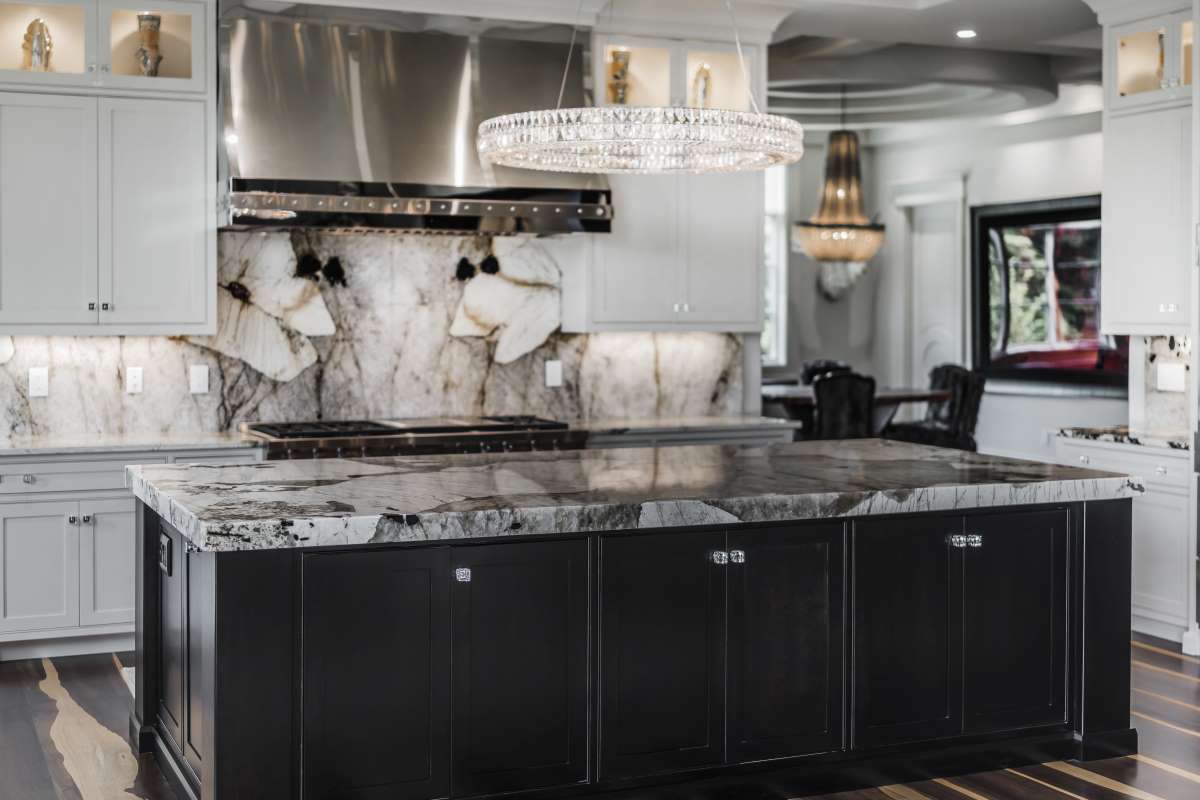 Traditional Transitional Kitchen With Dramatic Stone Surfaces And Contrasting Cabinetry Kitchen Remodel by Distinctive Marble & Granite project photo 8